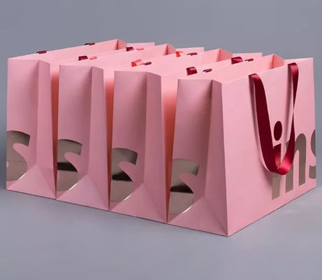 Papier d'emballage a réutilisé le sac à provisions de poignée de cordon de carton de sac de transporteur